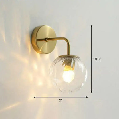 Gold-tone ripple glass wall sconce with round backplate and curved arm, 10.5in tall on Tampa Home & Garden Store
