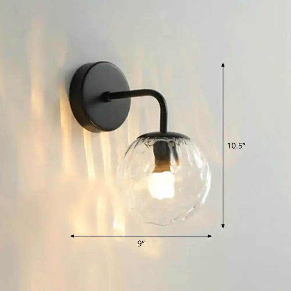 Black metal rippled sconce with clear glass globe, Decorbites wall light on Tampa Home & Garden Store