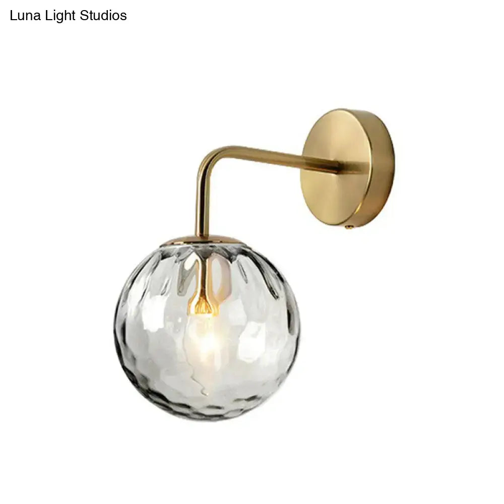 Black Metal Rippled Sconce brass curved arm with clear faceted glass globe wall mount on Tampa Home & Garden Store