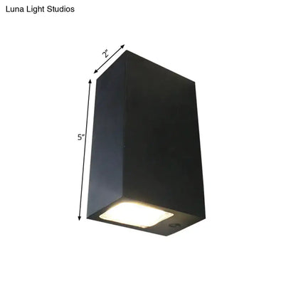 Black metal outdoor lamp by Decorbites; cube-shaped, 5in tall, emits warm light on Tampa Home & Garden Store