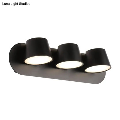 Black metal cone-shade sconce with three lights on Tampa Home & Garden Store