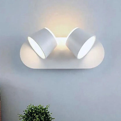 Black metal cone-shade sconce with two white cylindrical shades wall light on Tampa Home & Garden Store