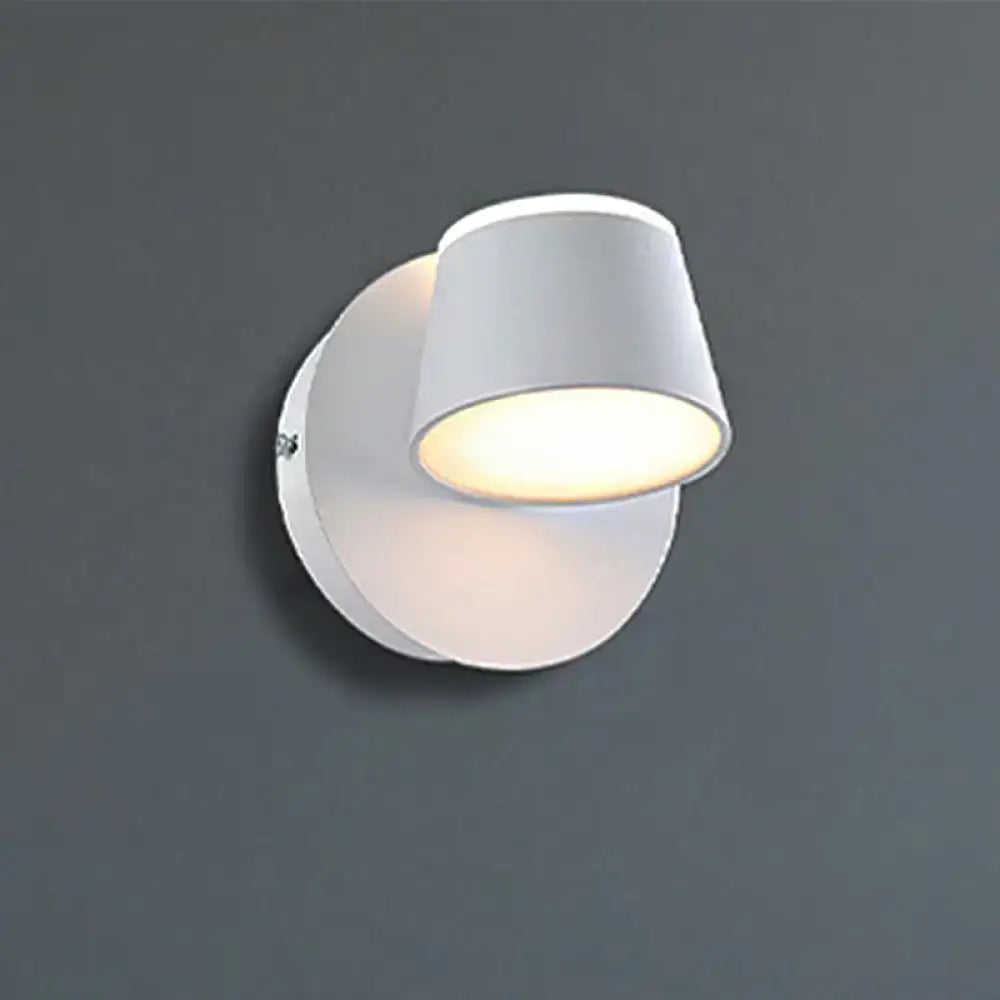 Black metal cone-shade wall sconce on a circular white backplate; Decorbites 1-3 light on Tampa Home & Garden Store
