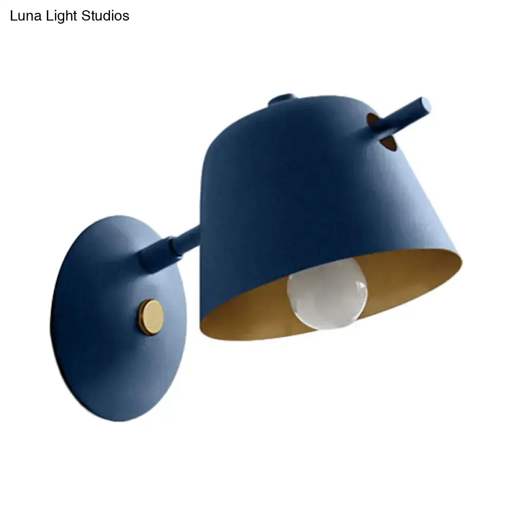 Blue metal wall light sconce with conical shade and gold interior by Decorbites on Tampa Home & Garden Store