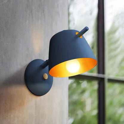 Black Metal Wall Light by Decorbites with blue-black shade and warm interior on Tampa Home & Garden Store