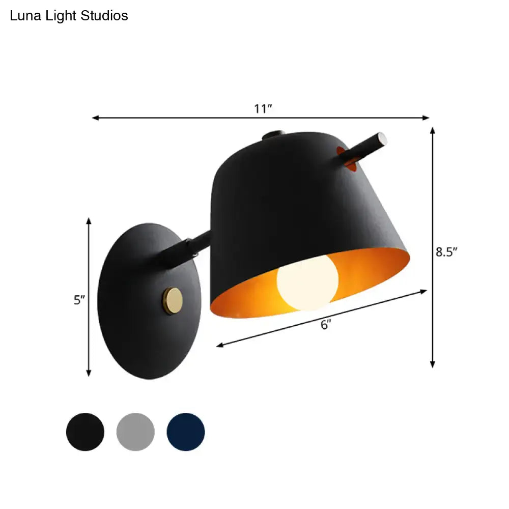 Black metal wall light by Decorbites with warm gold interior, 11in wide industrial sconce on Tampa Home & Garden Store