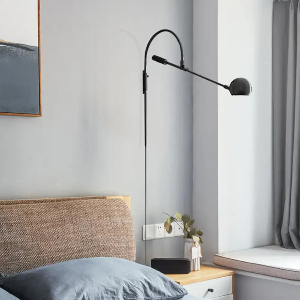 Black metal sphere sconce with curved arc arm by Decorbites in Home & Garden on Tampa Home & Garden Store
