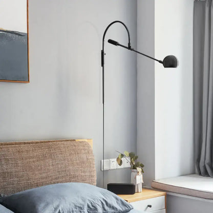 Black metal sphere sconce with curved arc arm by Decorbites in Home & Garden on Tampa Home & Garden Store