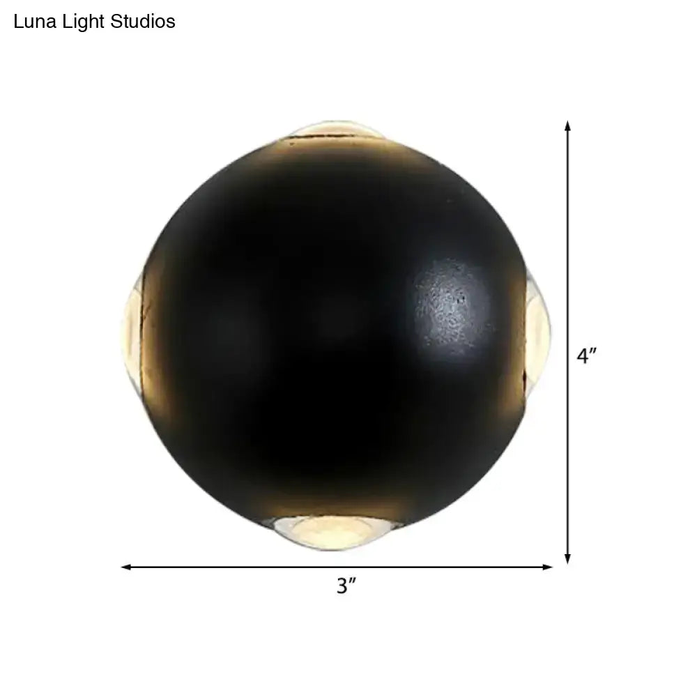 Black spherical outdoor sconce with gold accents, 3in diameter, 4in height on Tampa Home & Garden Store