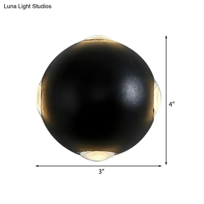 Black spherical outdoor sconce with gold accents, 3in diameter, 4in height on Tampa Home & Garden Store