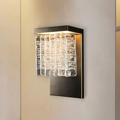 Modern black metal wall sconce with crystal prism, Decorbites living room fixture on Tampa Home & Garden Store