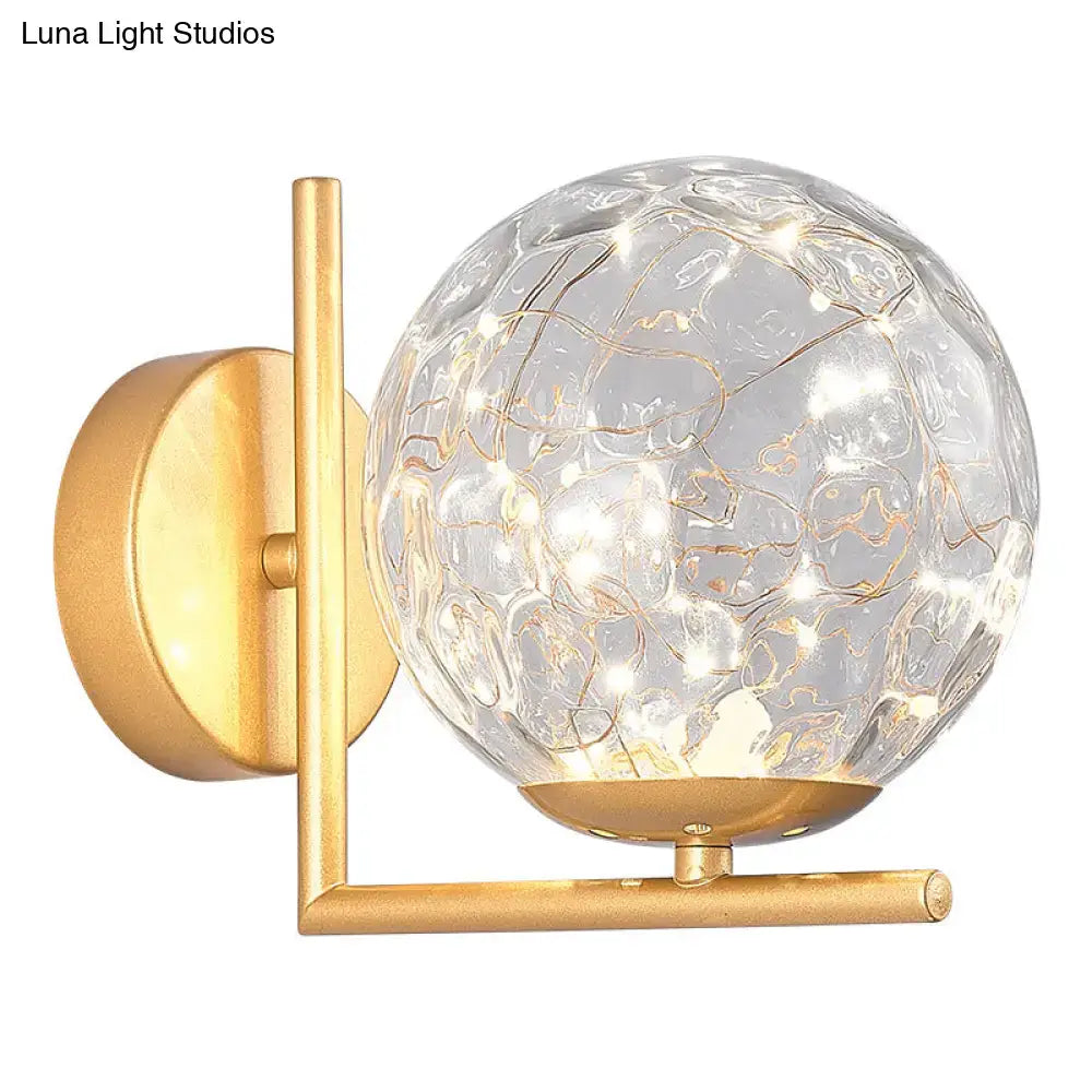 Black Globe Wall Sconce with gold metal arm and crackle glass globe Decorbites on Tampa Home & Garden Store