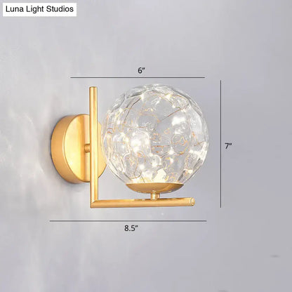 Black Globe Wall Sconce by Decorbites with crackled glass globe on brass-tone mount on Tampa Home & Garden Store