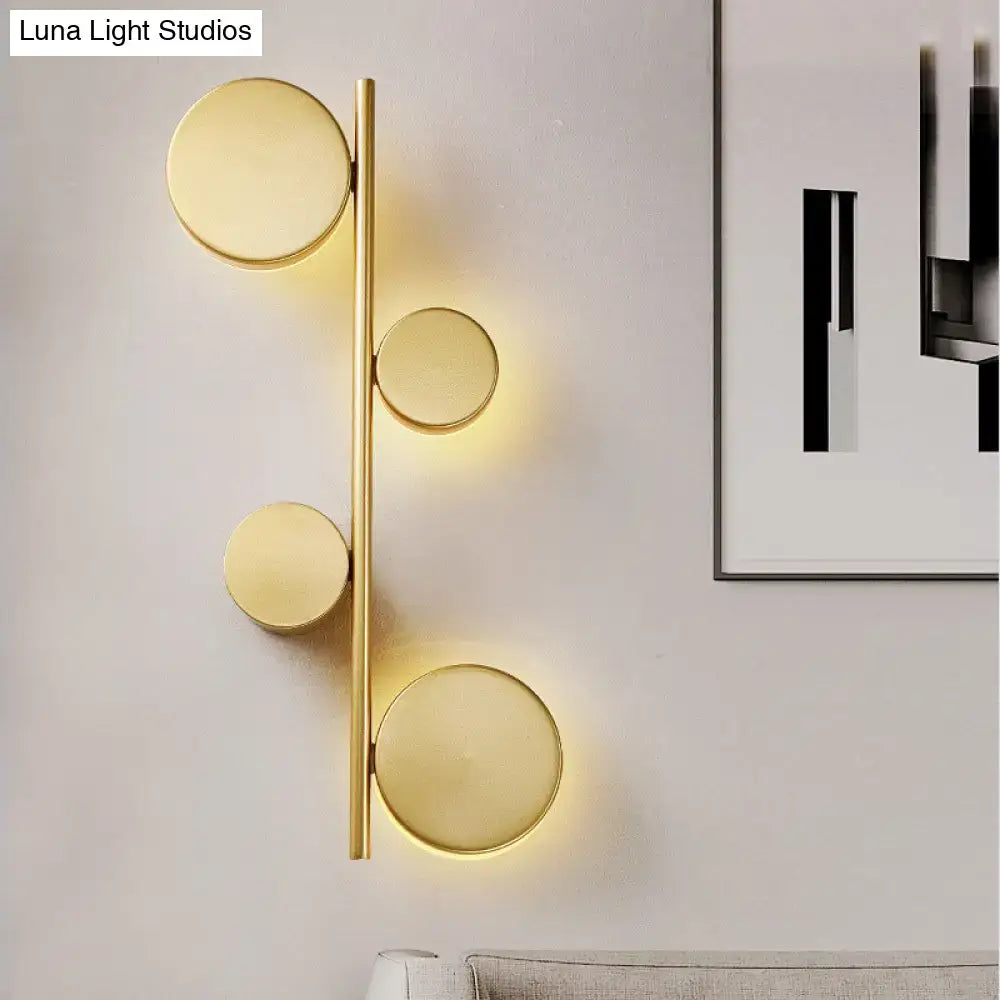 Black Circle Wall Sconce by Decorbites, brass finish with gold circles, modern lighting on Tampa Home & Garden Store