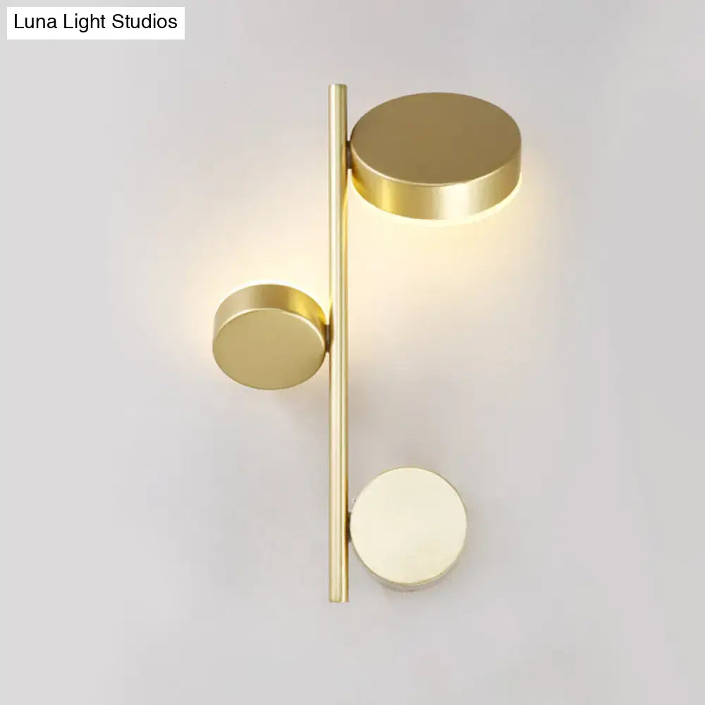 Decorbites Black Circle Wall Sconce with brass-tone finish and circular discs on vertical rod on Tampa Home & Garden Store