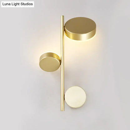 Decorbites Black Circle Wall Sconce with brass-tone finish and circular discs on vertical rod on Tampa Home & Garden Store