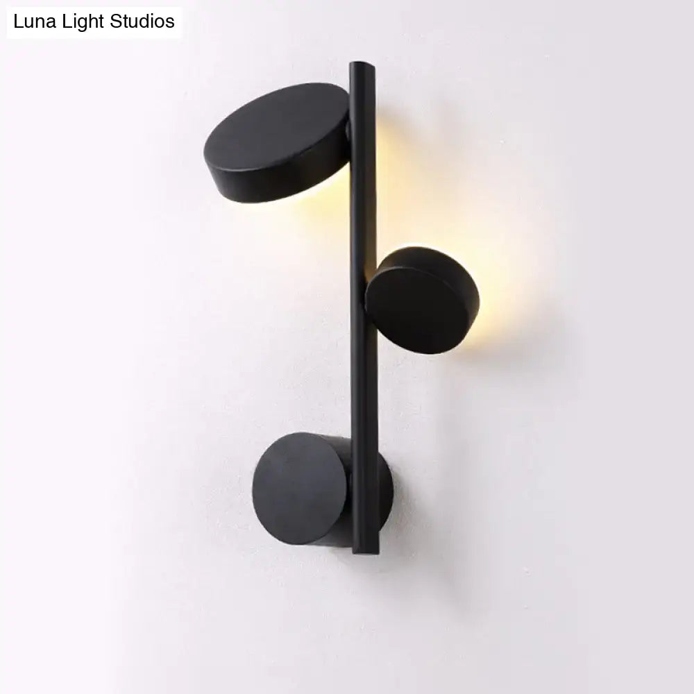 Black Circle Wall Sconce by Decorbites black metal wall lamp with two discs and warm glow on Tampa Home & Garden Store