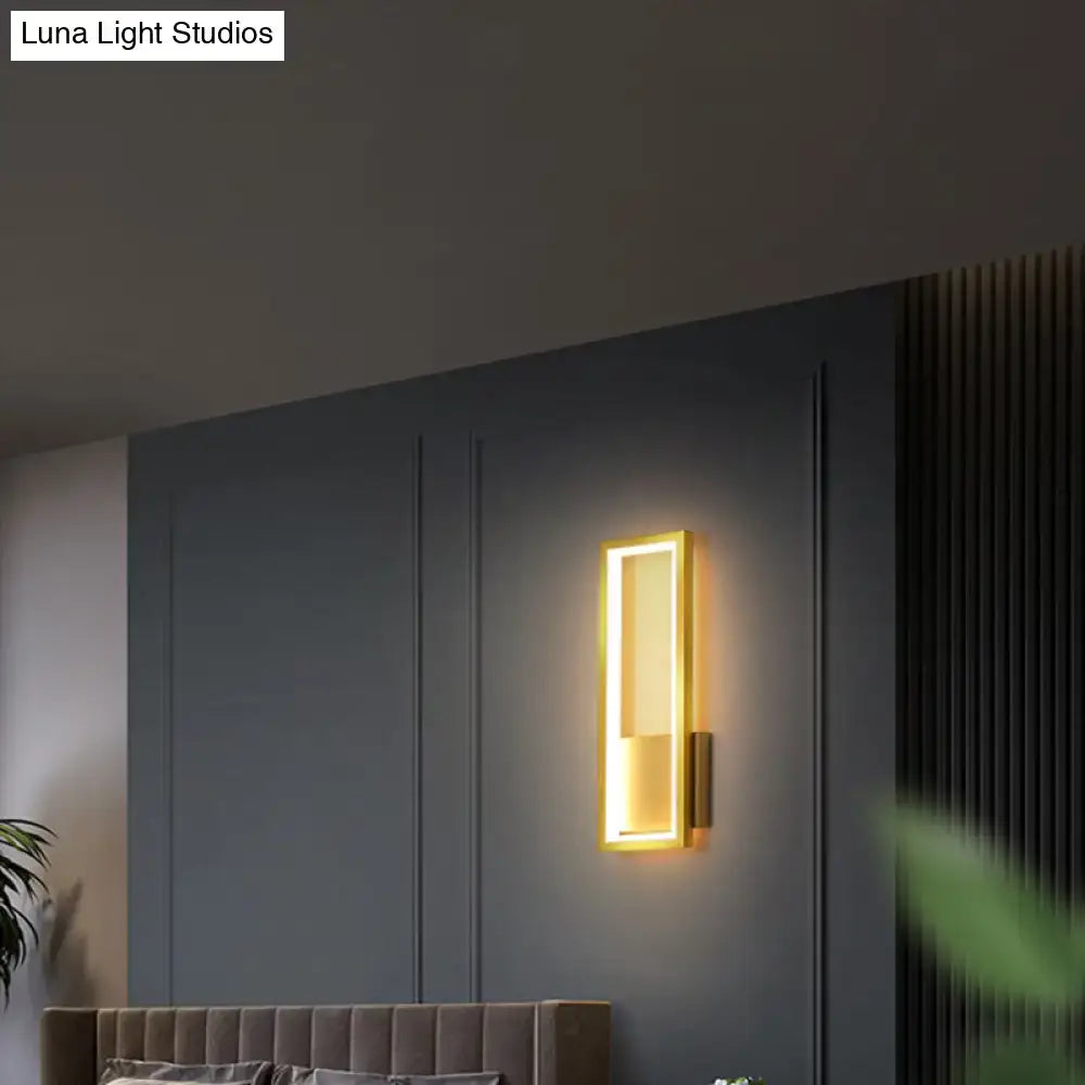Modern black matte minimalist LED wall sconce with warm rectangular glow Decorbites on Tampa Home & Garden Store