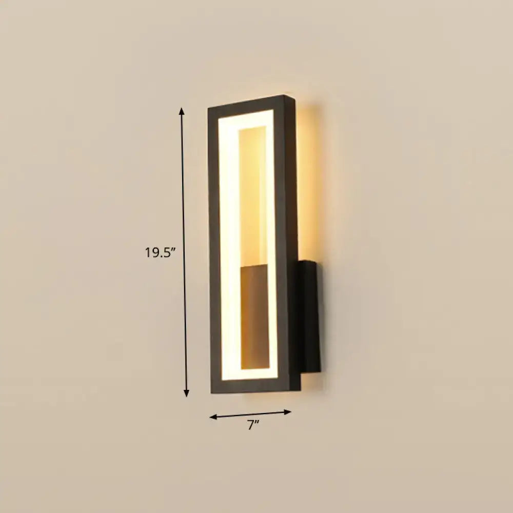 Modern black minimalist LED wall sconce by Decorbites with rectangular frame and warm light on Tampa Home & Garden Store