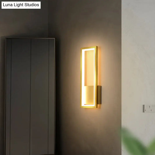 Modern black minimalist LED wall sconce, rectangular with warm gold-tone inner frame Decorbites on Tampa Home & Garden Store