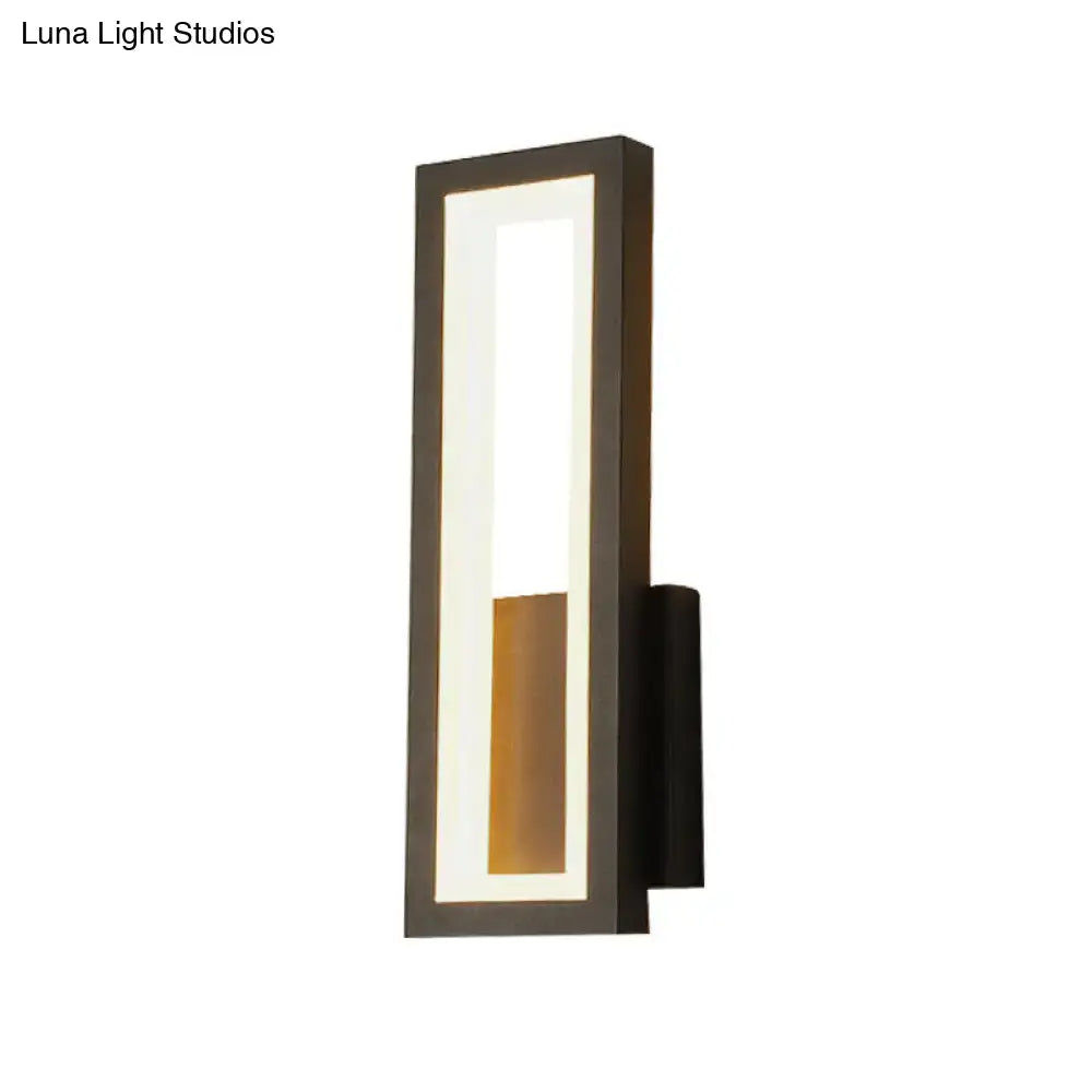 Modern black minimalist LED wall sconce with acrylic panel, vertical rectangular design on Tampa Home & Garden Store