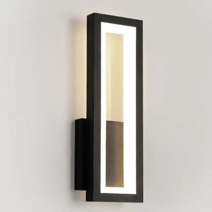 Modern black minimalist LED wall sconce by Decorbites with acrylic light panel on Tampa Home & Garden Store