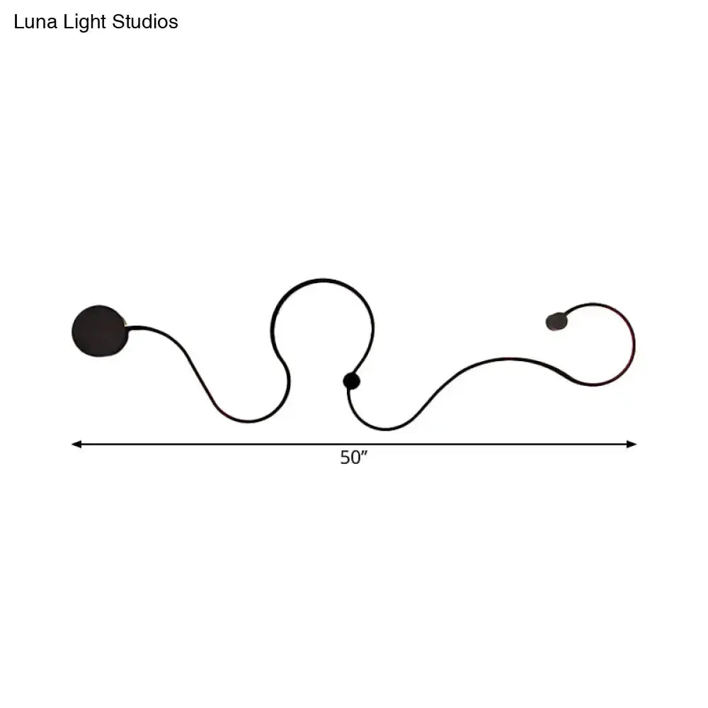 Modern black minimalist wall lamp with looping cord, 50-inch span, living room sconce on Tampa Home & Garden Store