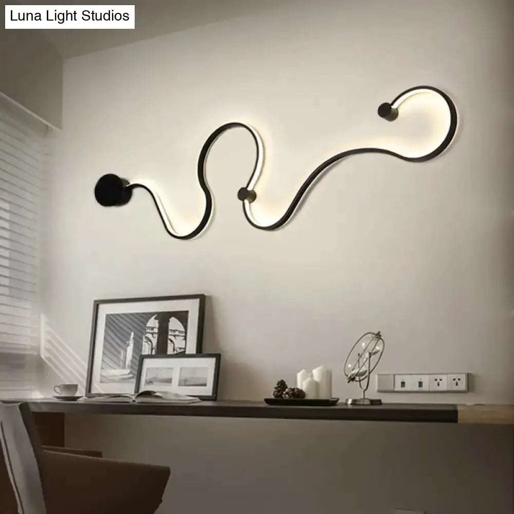 Decorbites modern black minimalist wall lamp with a wavy LED sconce for living room decor on Tampa Home & Garden Store