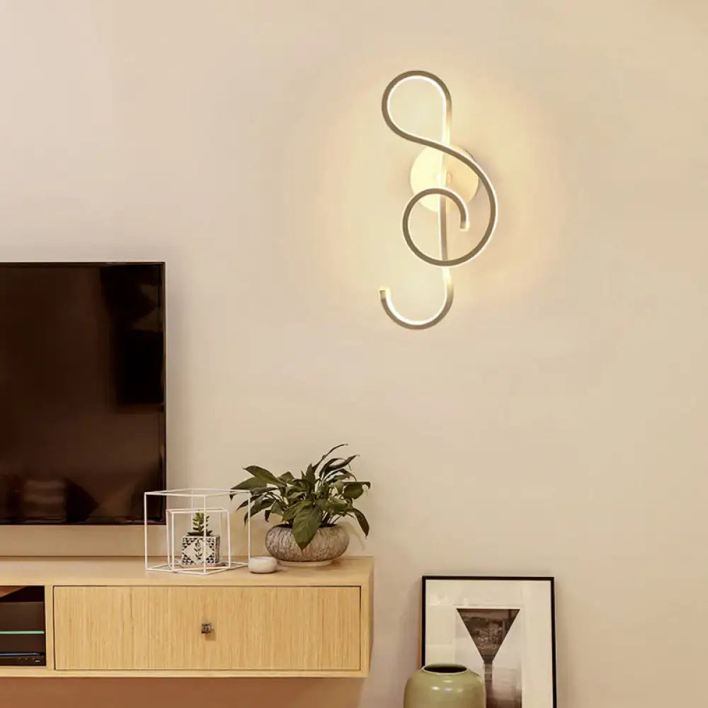 Black Music Note Sconce by Decorbites, black metal wall lamp with warm glow on Tampa Home & Garden Store