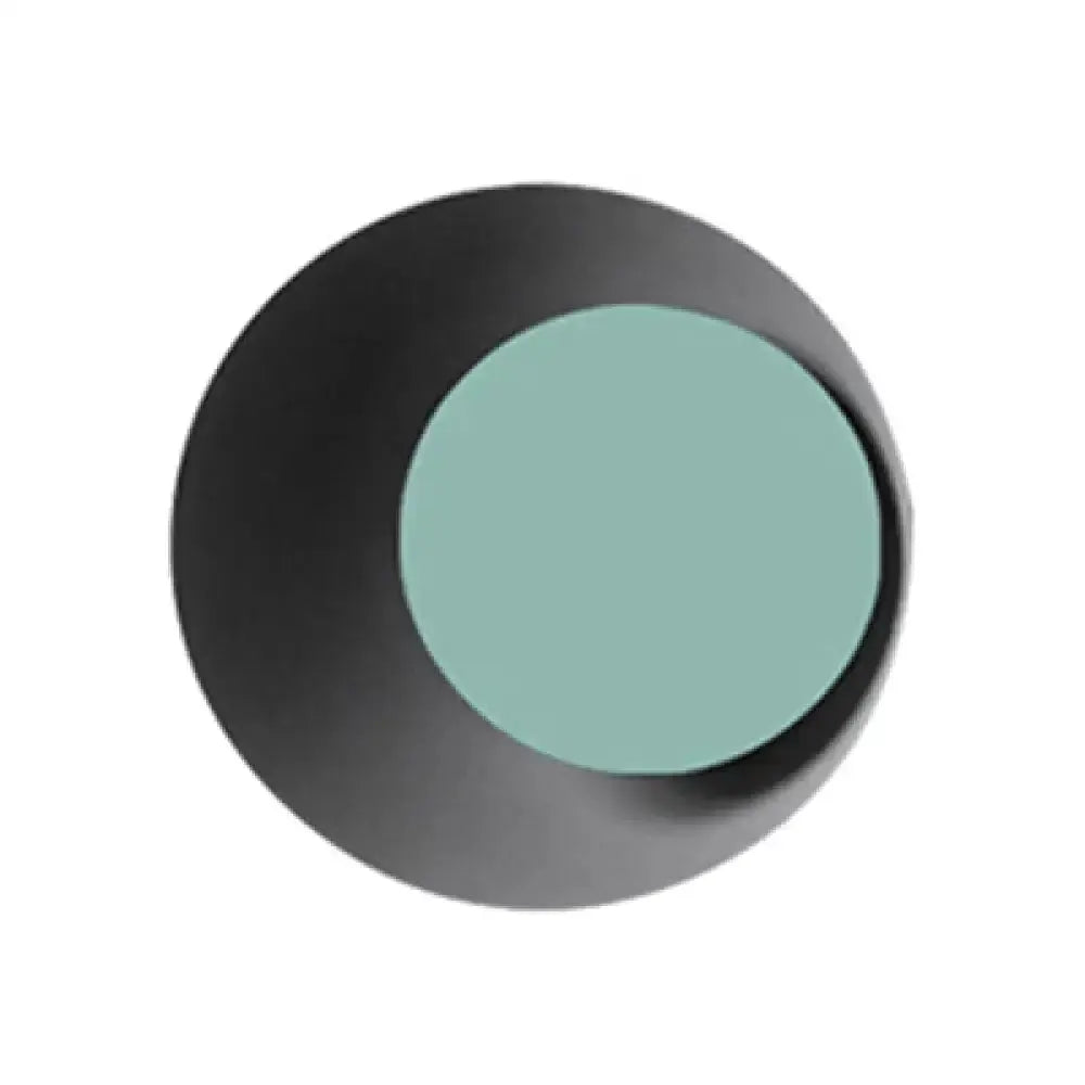 Modern circle wall sconce by Decorbites with black outer disk and teal center on Tampa Home & Garden Store