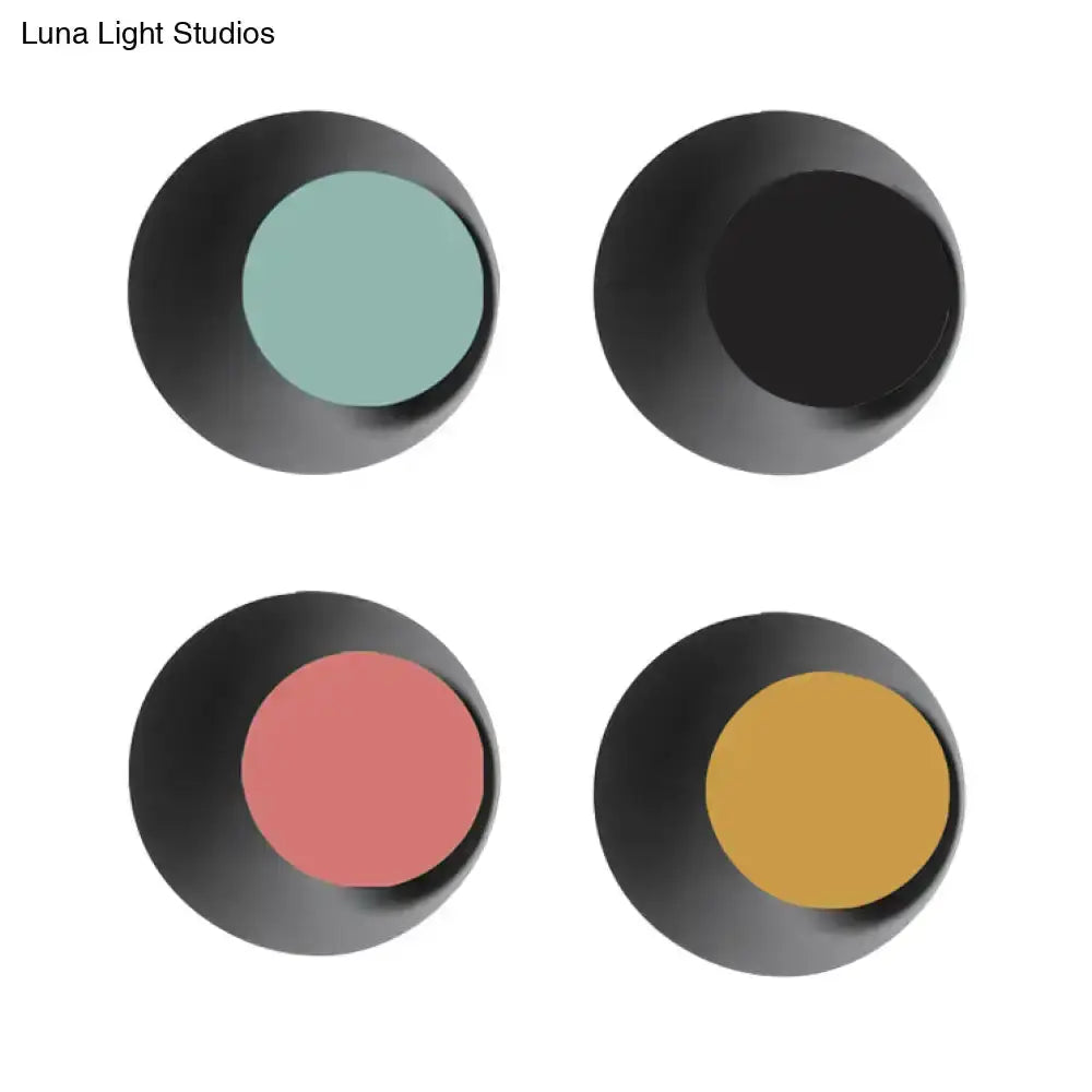 Modern circle sconce light set of four by Luna Light Studios with black metal backs and teal pink coral mustard faces on Tampa Home & Garden Store