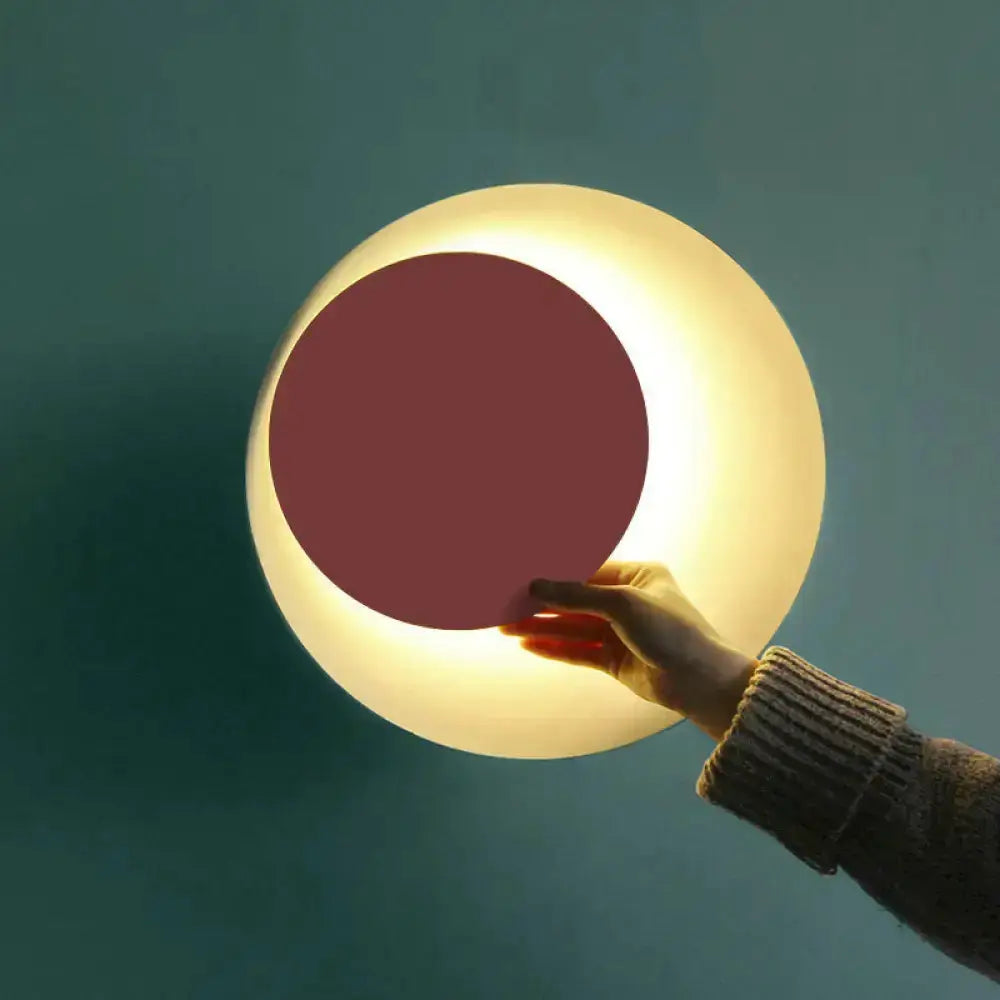 Decorbites modern black pink circle sconce wall light for bedroom with pink center glow on Tampa Home & Garden Store