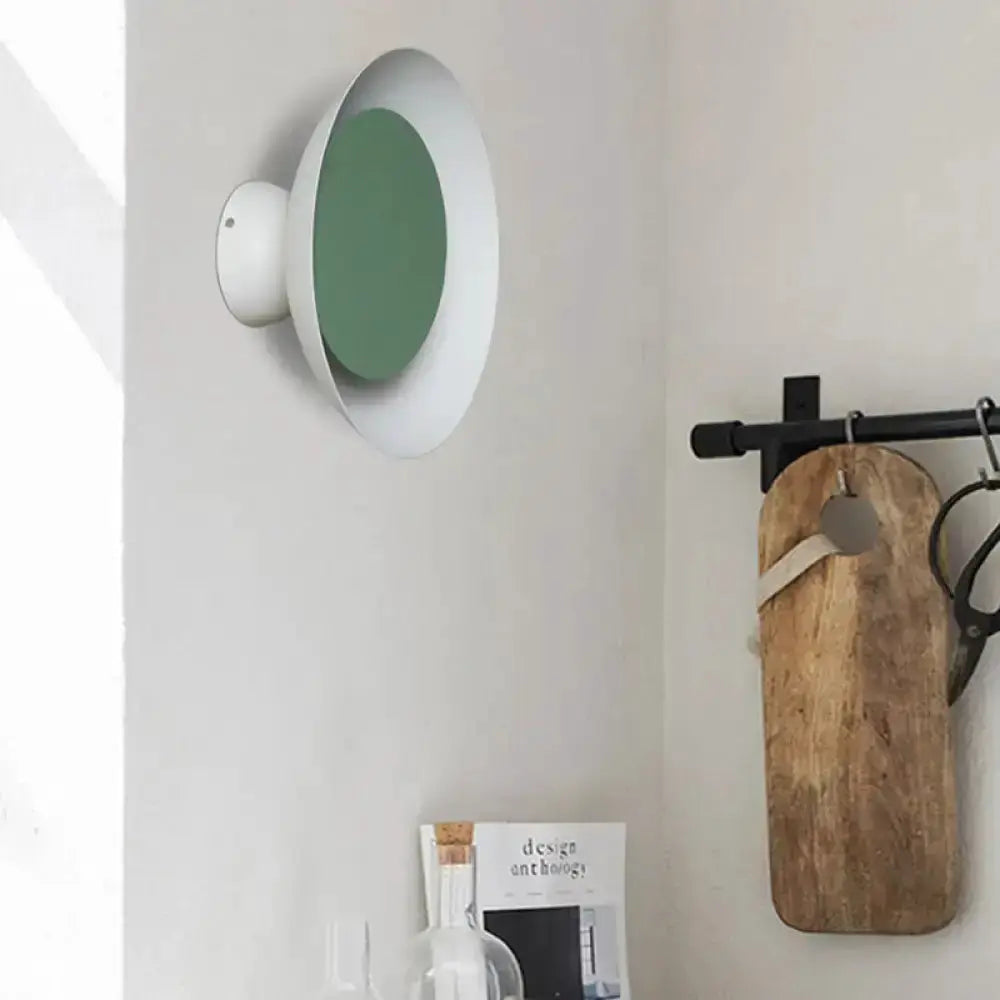 Modern circle sconce light with white outer ring and green center for bedroom wall decor on Tampa Home & Garden Store
