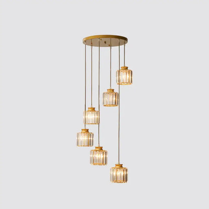 Black crystal cylindrical stairway pendant light with gold-tone crystal shades on Tampa Home & Garden Store