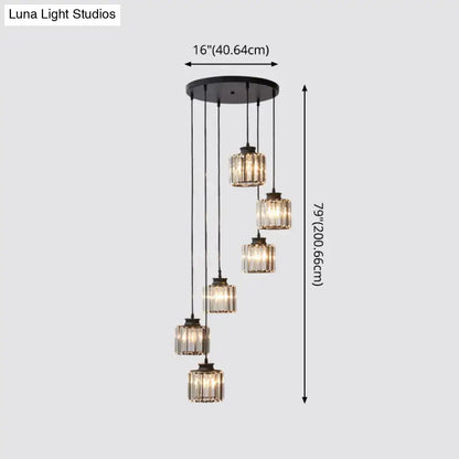 Black crystal cylindrical stairway pendant lights with six hanging shades from a round canopy on Tampa Home & Garden Store