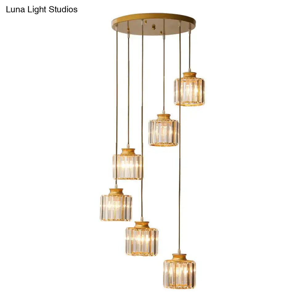 Black crystal cylindrical stairway pendant light by Decorbites, six brass pendants on Tampa Home & Garden Store