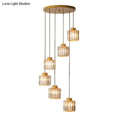 Black crystal cylindrical stairway pendant light by Decorbites, six brass pendants on Tampa Home & Garden Store