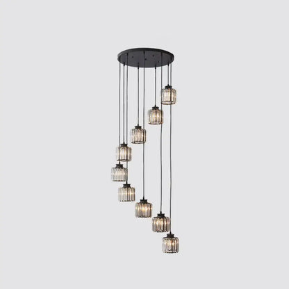 Black crystal cylindrical stairway pendant light cluster with nine cages on black cords on Tampa Home & Garden Store