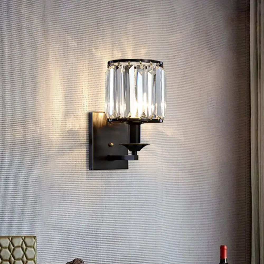 Black crystal cylindrical wall sconce with clear prisms by Decorbites on Tampa Home & Garden Store
