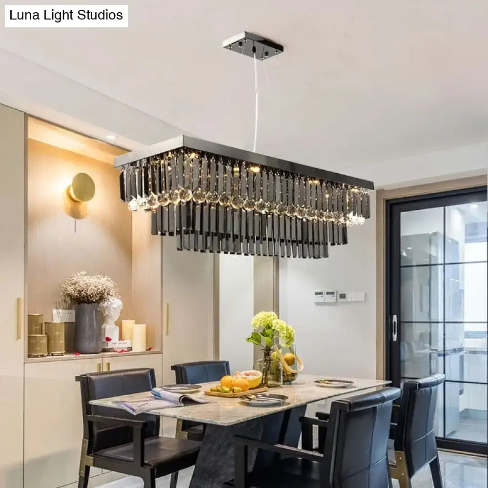 Black Crystal Rectangle Chandelier with hanging prisms over a marble dining table on Tampa Home & Garden Store