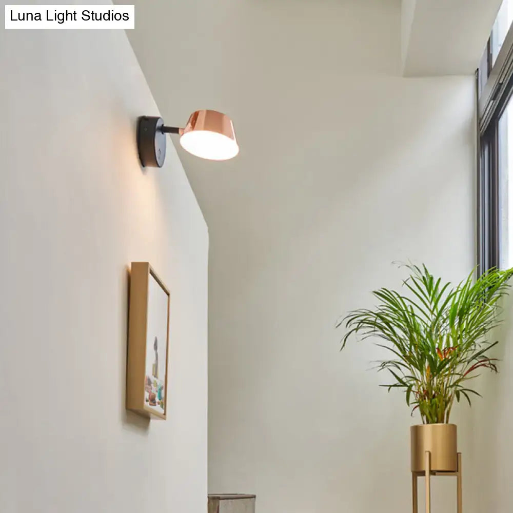 Copper Modern Sconce Light by Decorbites with copper shade and black wall mount, warm glow on Tampa Home & Garden Store