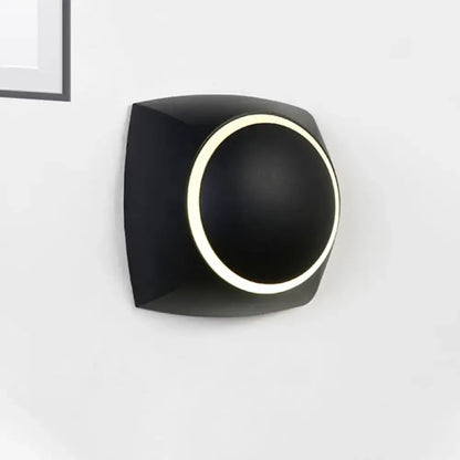 Black industrial LED wall sconce with round illuminated ring on square backplate Decorbites on Tampa Home & Garden Store