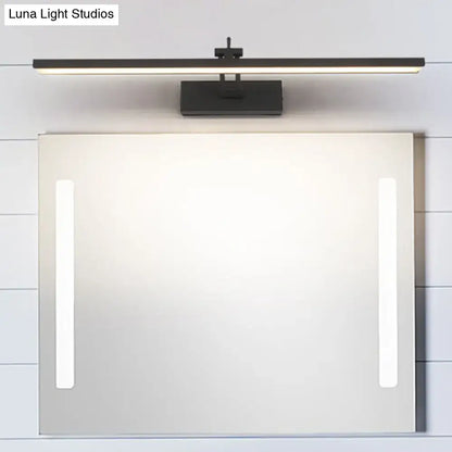 Black rotatable vanity sconce Decorbites with bar light above a mirror and LED side lights on Tampa Home & Garden Store