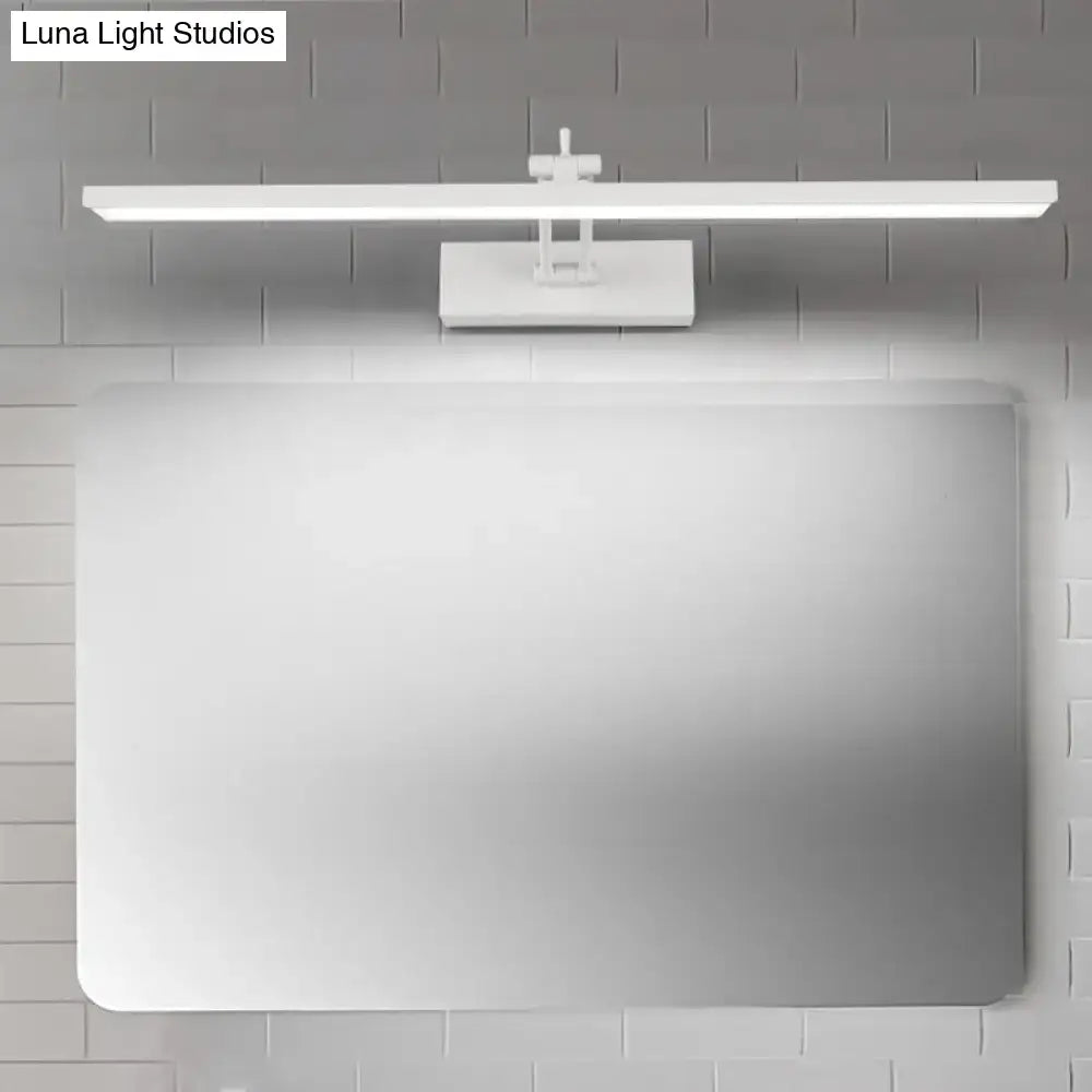 Black Rotatable Vanity Sconce by Decorbites with long light bar above a mirror on Tampa Home & Garden Store