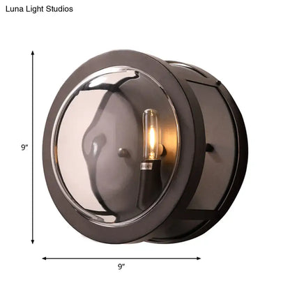 Black metal wall sconce by Decorbites with round crystal shade, 9-inch diameter on Tampa Home & Garden Store