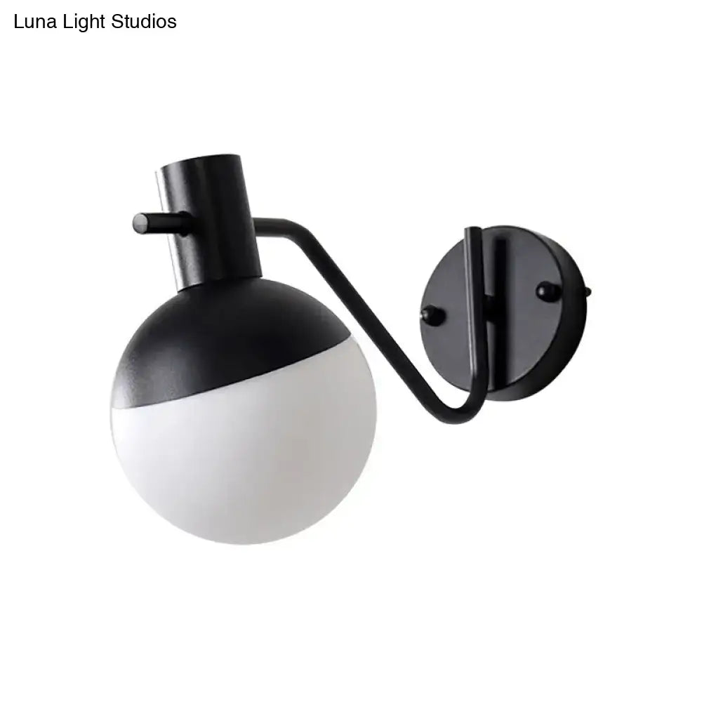 Black glass shade sconce by Decorbites on Tampa Home & Garden Store