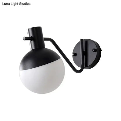 Black glass shade sconce by Decorbites on Tampa Home & Garden Store