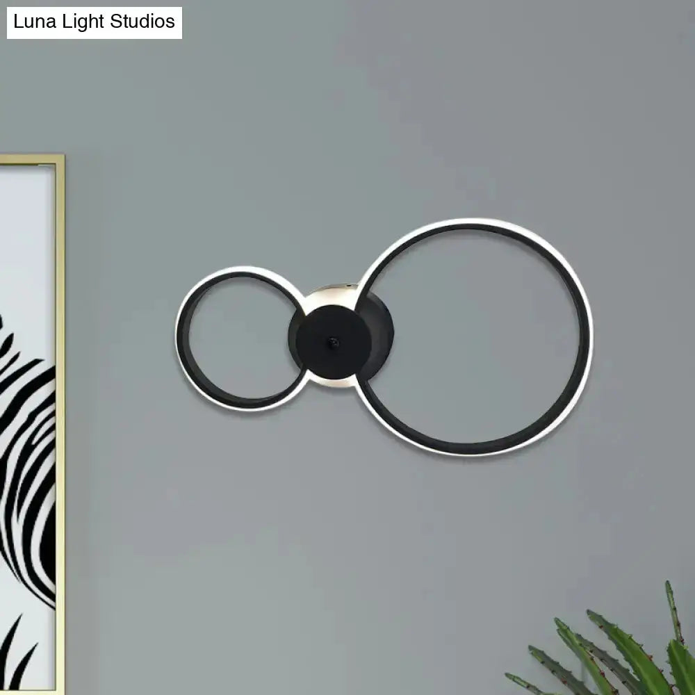 Decorbites modern LED hoop wall lamp, black and silver double-ring design on Tampa Home & Garden Store