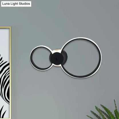 Decorbites modern LED hoop wall lamp, black and silver double-ring design on Tampa Home & Garden Store