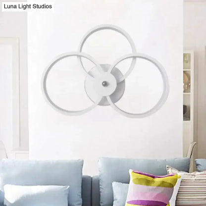 Modern LED hoop wall lamp with 3 interlocking rings, black and silver by Decorbites on Tampa Home & Garden Store